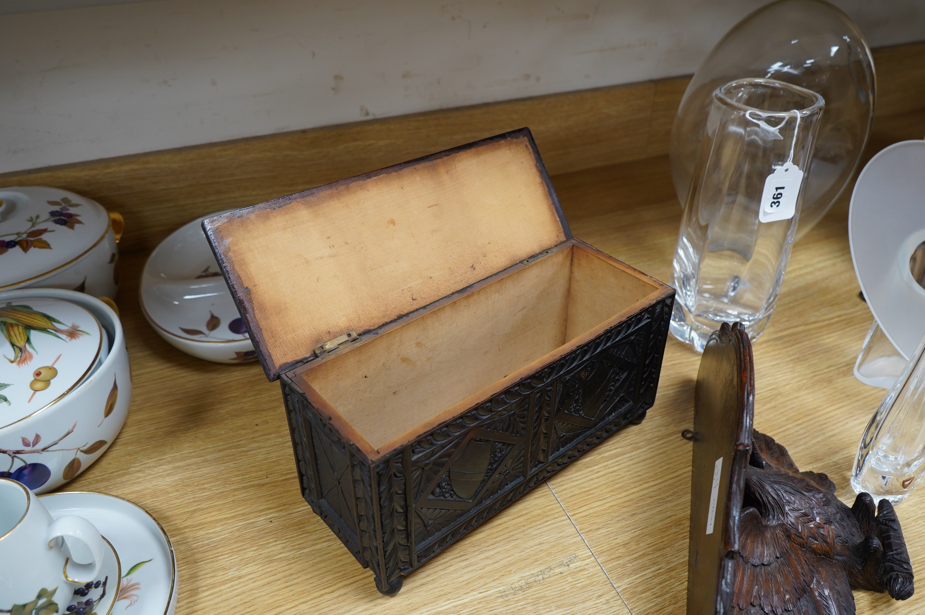 A late 19th century carved walnut and beech eagle wall bracket and a miniature coffer, largest 37cm wide. Condition - fair